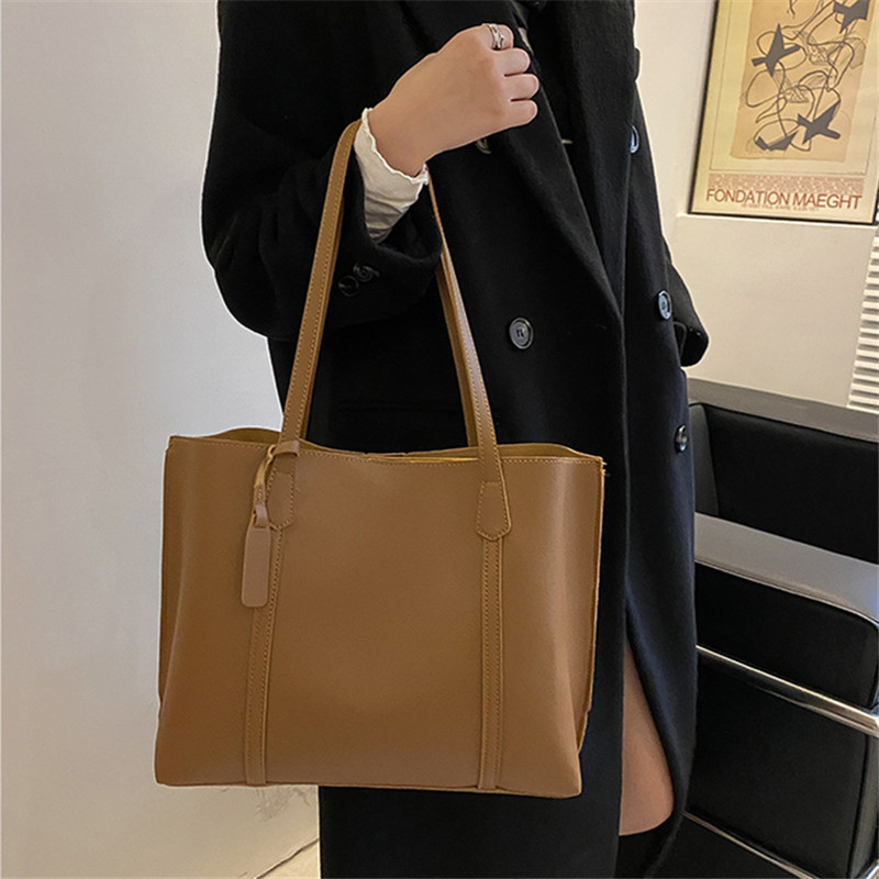 Classic Black Faux Leather Tot - Leather Work Handbags For Women recension och pris
